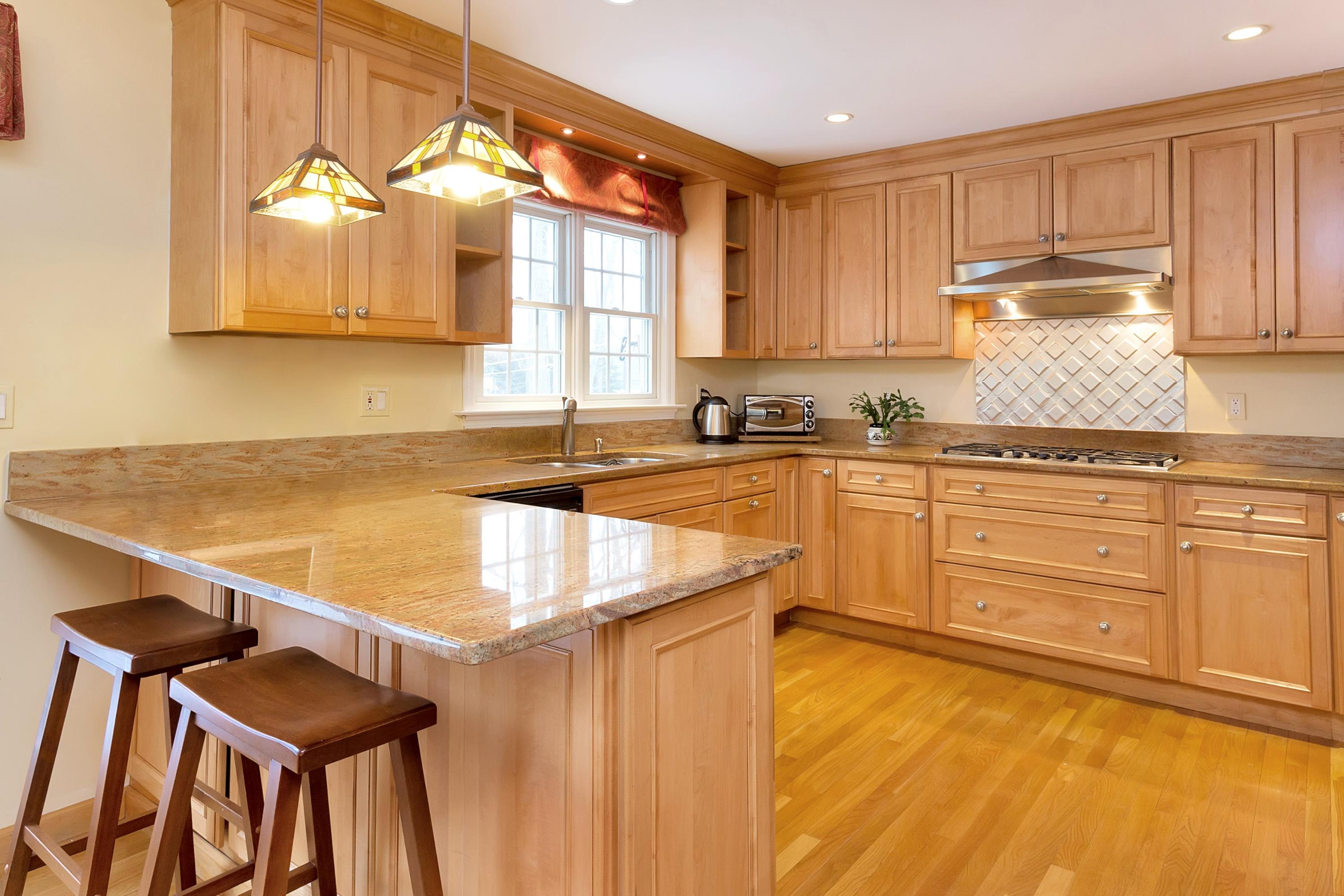 5 Country Club Road Darien, CT 06820 - Photo 8 of 20 a kitchen with granite countertop a sink and cabinets