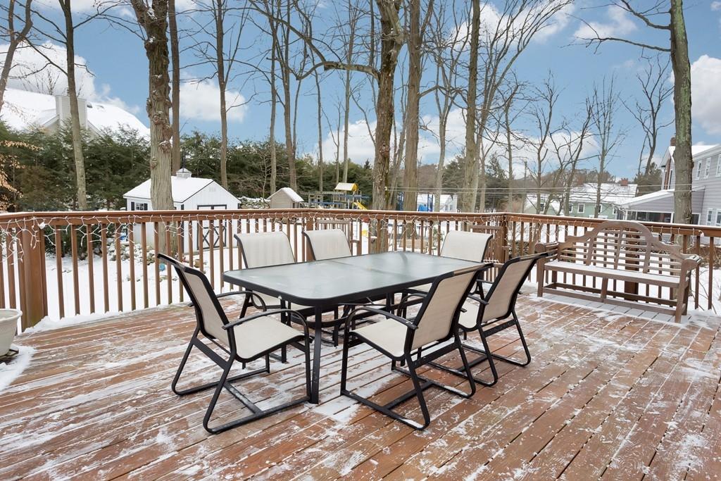 5 Country Club Road Darien, CT 06820 - Photo 10 of 20 a view of a chairs and table on the deck