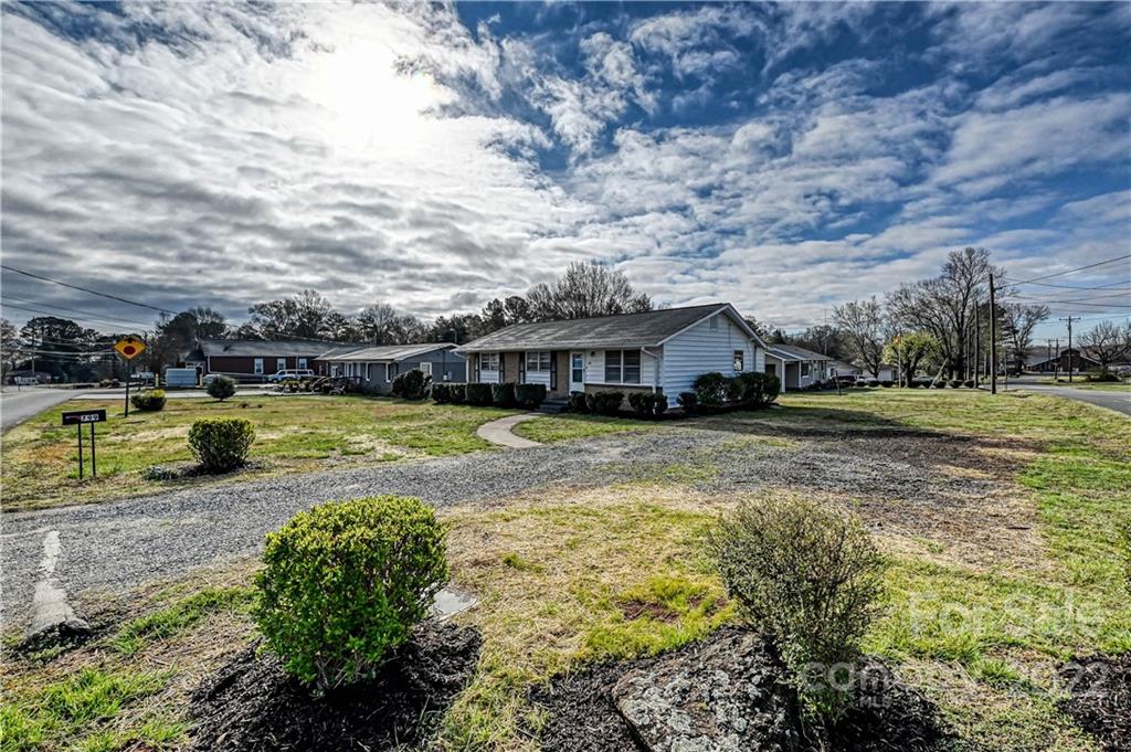 799 Sunderland Road Southwest Concord, NC 28027 - Photo 24 of 26 a view of a house with swimming pool and sitting area