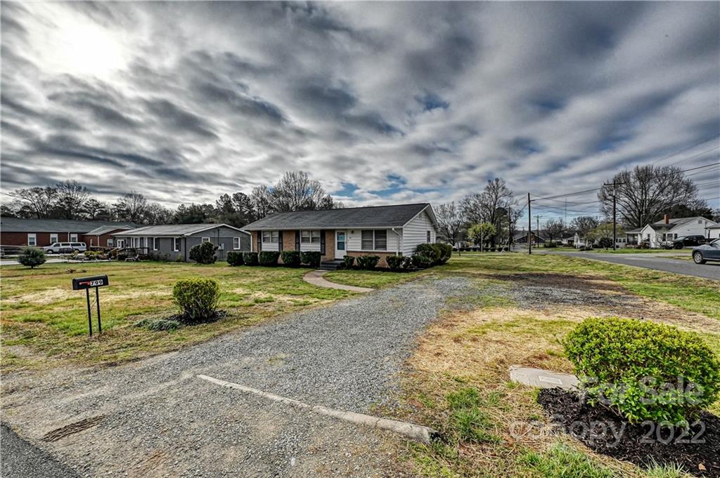 799 Sunderland Road Southwest Concord, NC 28027 - Photo 25 of 26 a view of a swimming pool with a yard