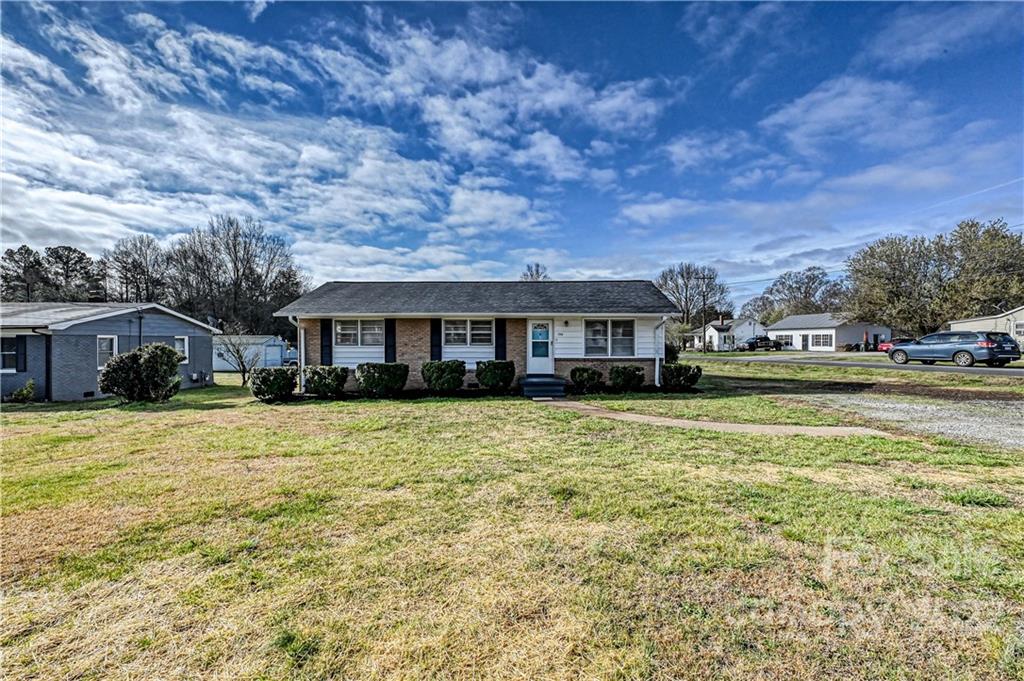 799 Sunderland Road Southwest Concord, NC 28027 - Photo 26 of 26 a front view of a house with a garden