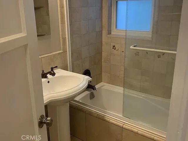 a bathroom with a toilet and a sink