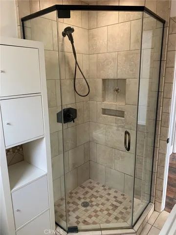 a city street lined with tall buildings