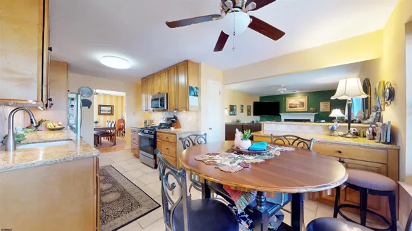 a view of a dining room with furniture
