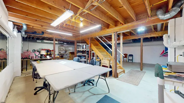 a view of a deck with wooden floor and iron stairs