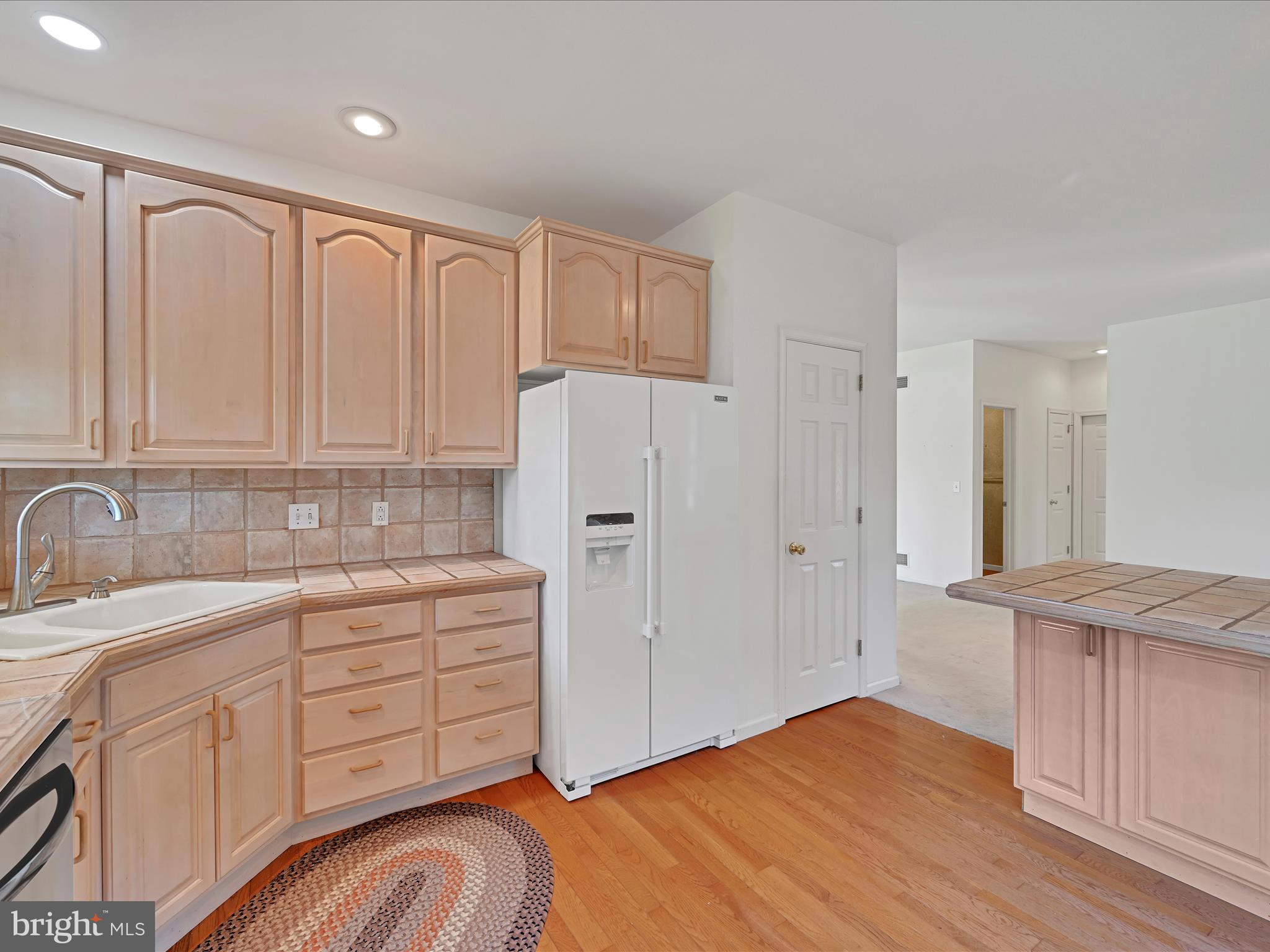 520 Waterside Circle Lebanon, PA 17042 - Photo 14 of 35 a kitchen with a refrigerator sink and cabinets
