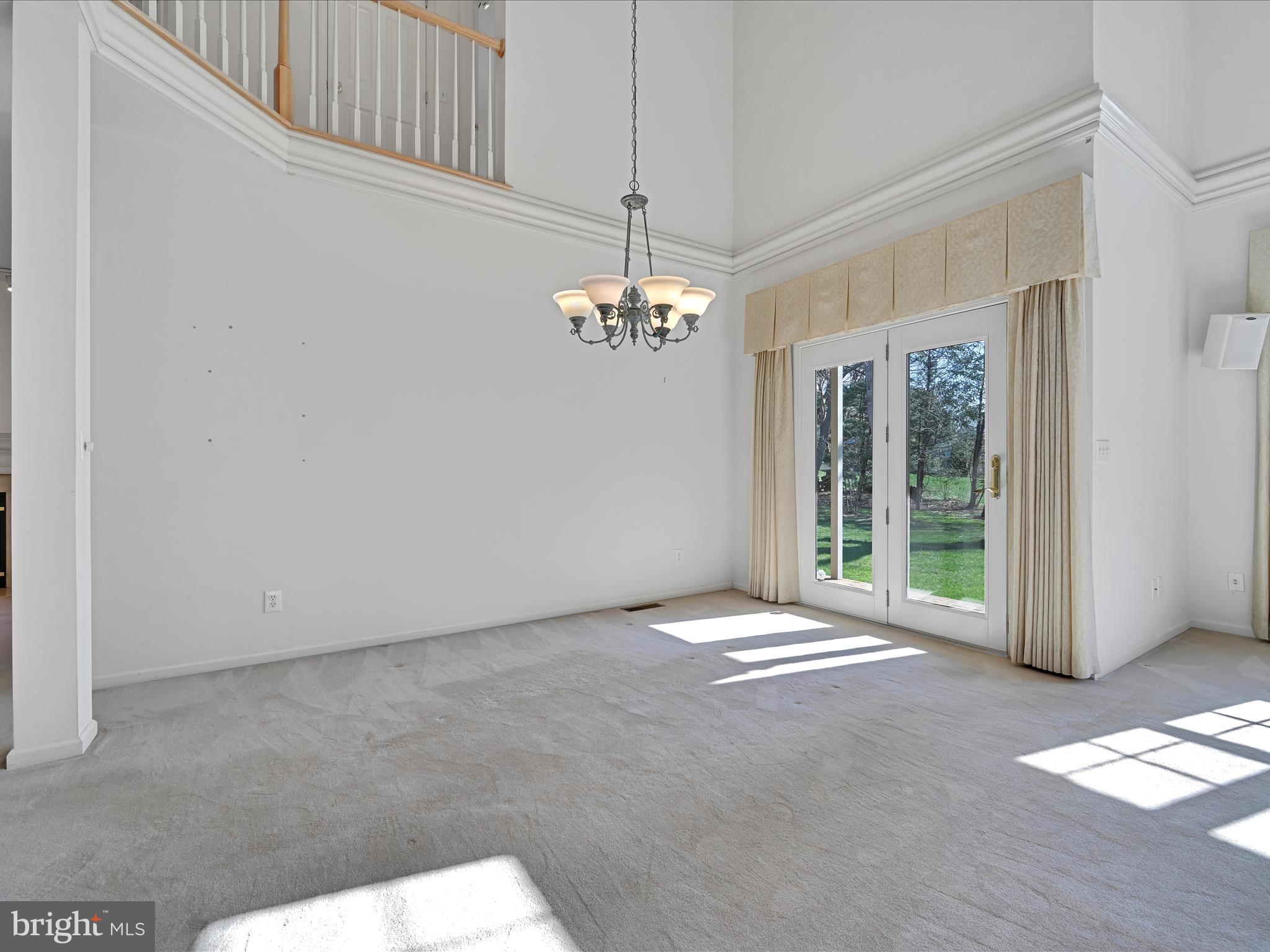 520 Waterside Circle Lebanon, PA 17042 - Photo 10 of 35 a view of a big room with windows and chandelier