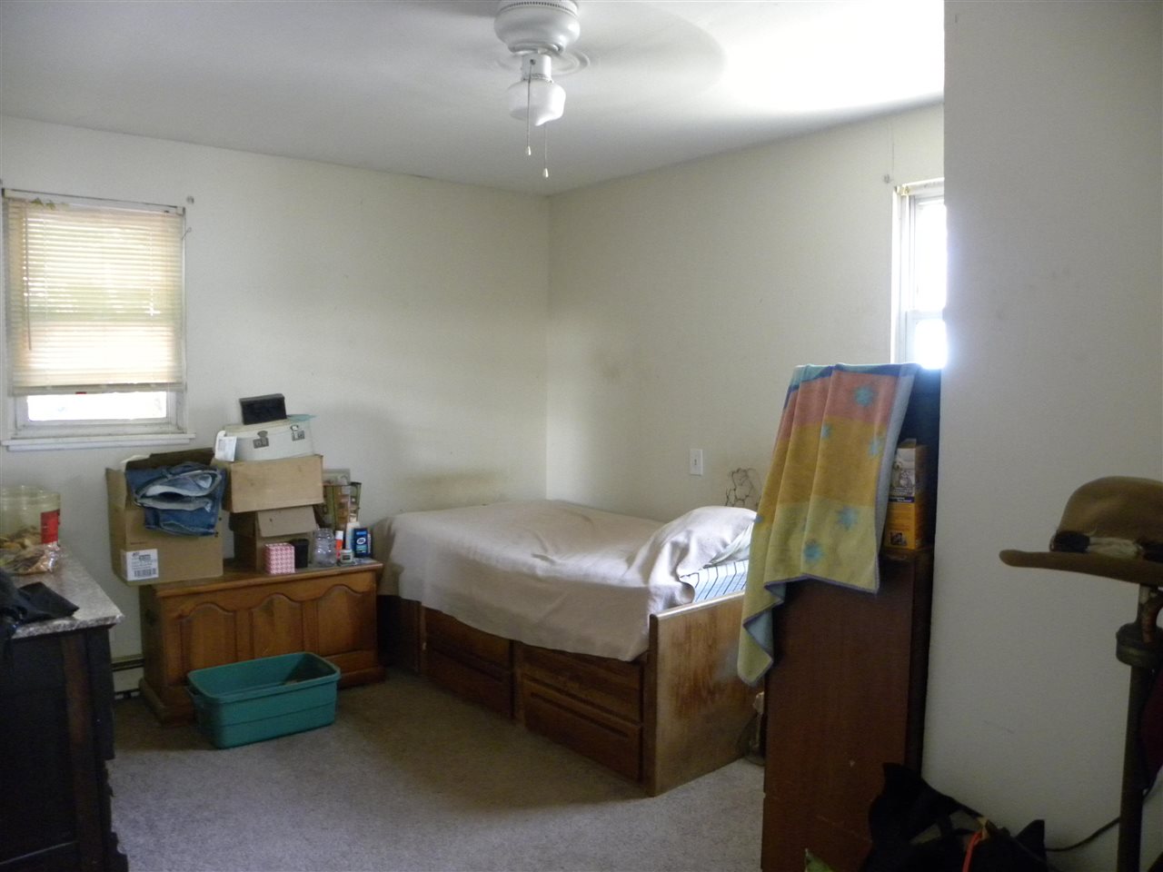52 Warwick Road Villas, NJ 08251 - Photo 12 of 20 a bedroom with a bed and a window