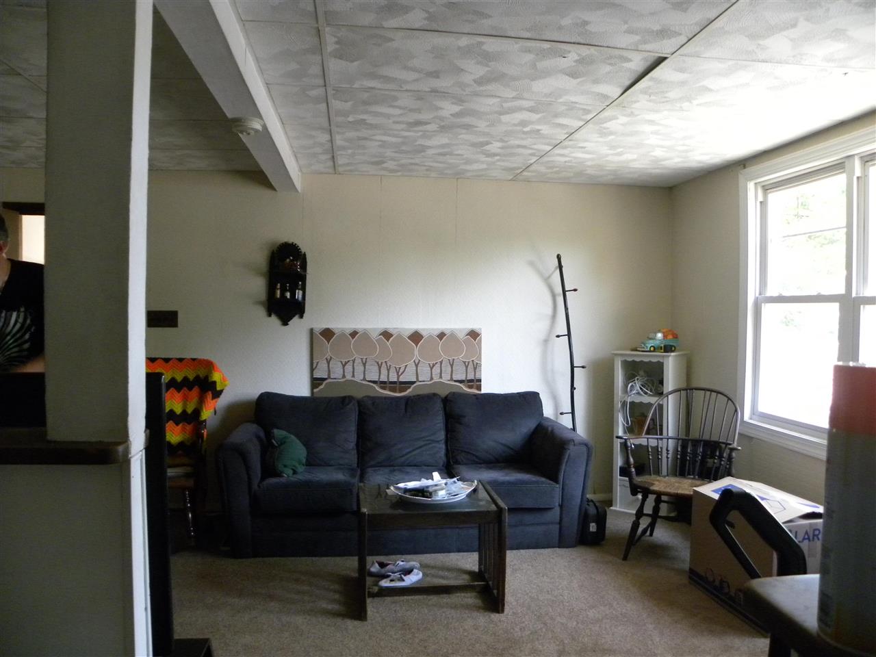 52 Warwick Road Villas, NJ 08251 - Photo 6 of 20 a living room with furniture and a window