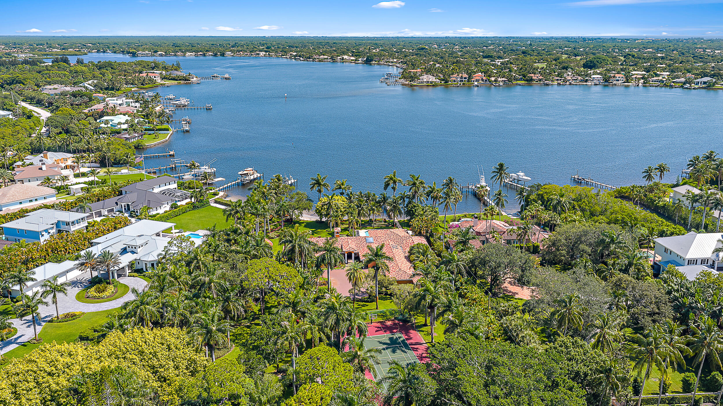 5900 Pennock Point Road Jupiter, FL 33458 - Photo 1 of 21 a view of a lake with a city