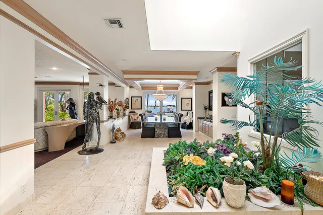 a view of living room with furniture and wooden floor