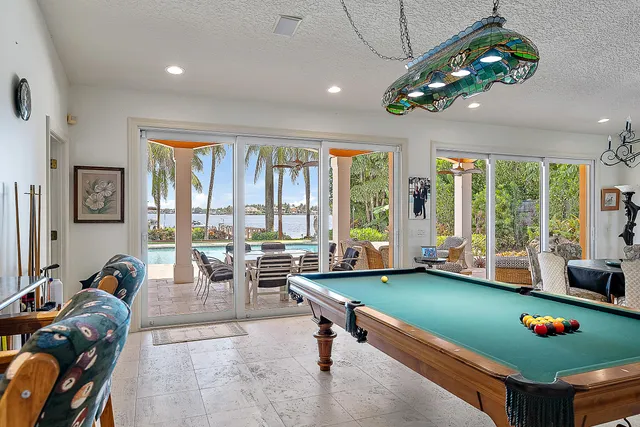 a view of living room filled with furniture