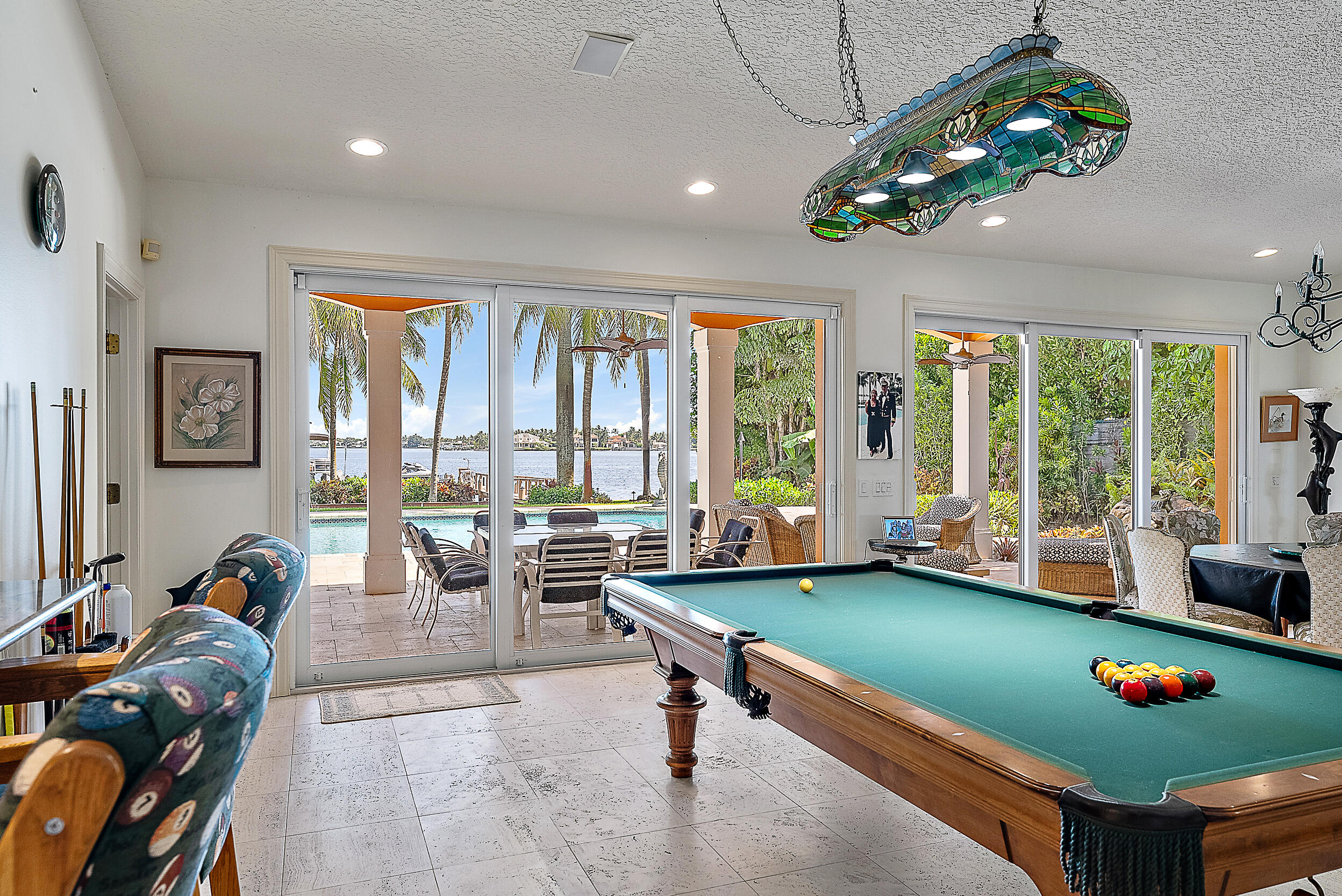 5900 Pennock Point Road Jupiter, FL 33458 - Photo 19 of 21 a living room with furniture and a dining table