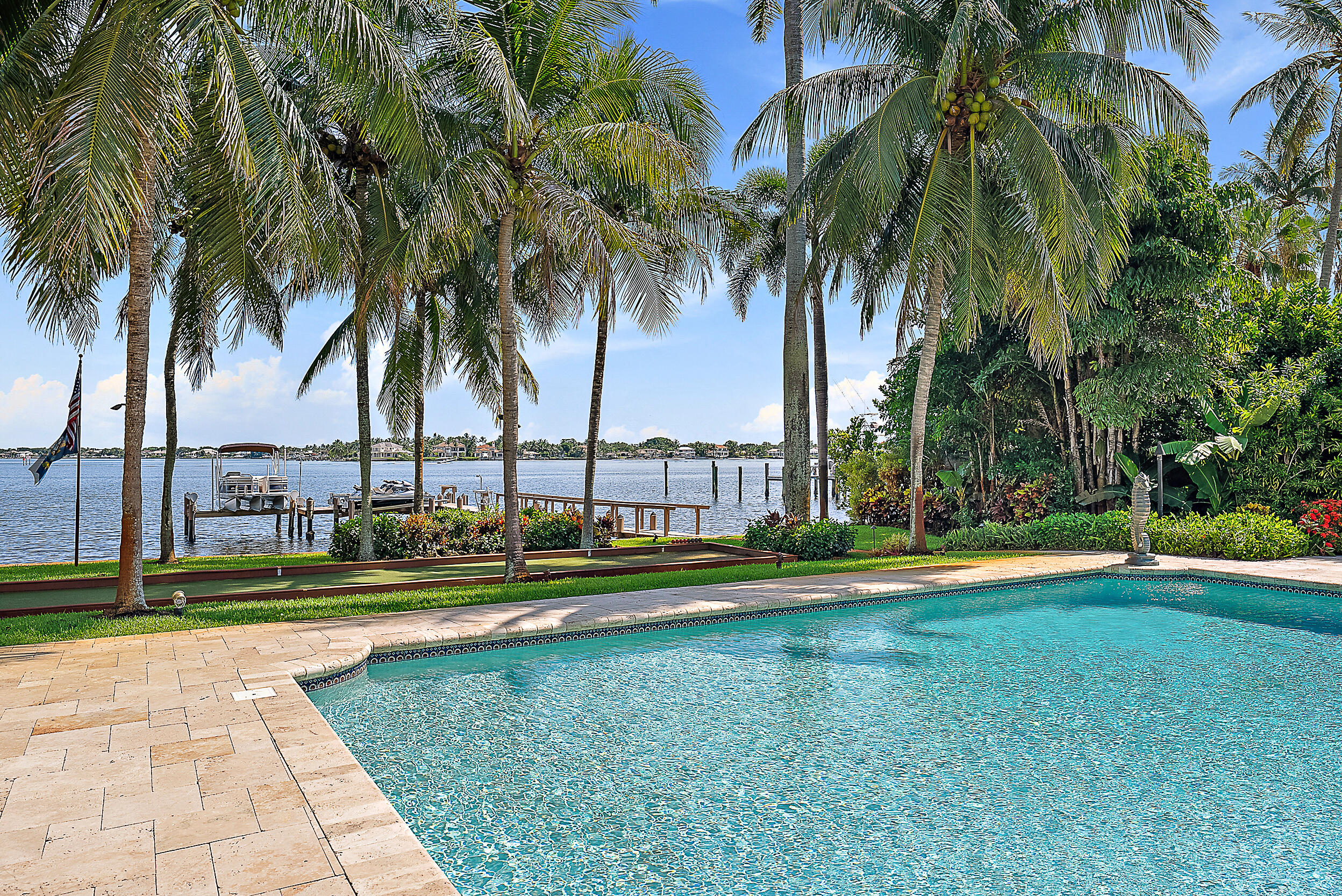 5900 Pennock Point Road Jupiter, FL 33458 - Photo 8 of 21 a view of a yard with swimming pool