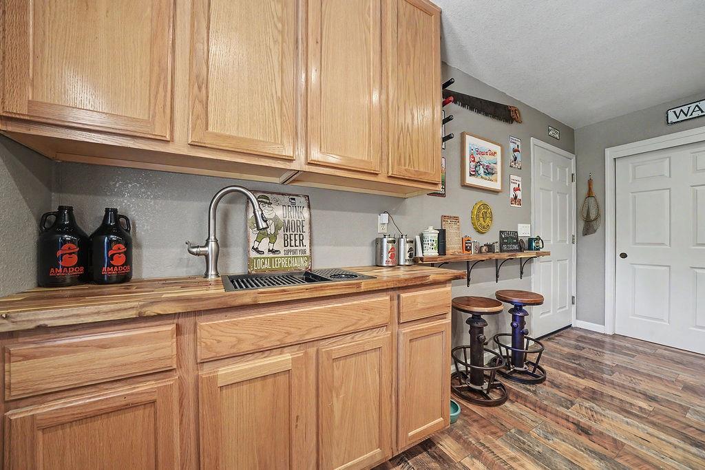 26845 Spring Court Pioneer, CA 95666 - Photo 5 of 89 a kitchen with stainless steel appliances granite countertop a sink and cabinets