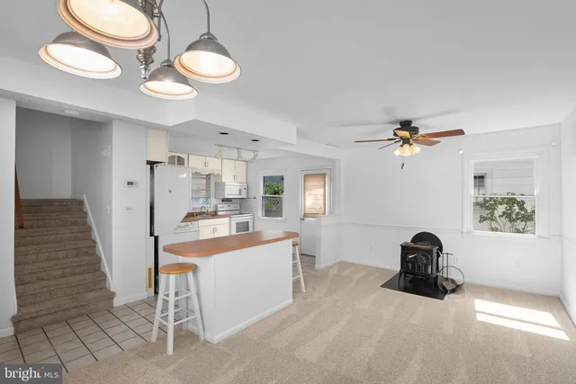 a view of a workspace with furniture