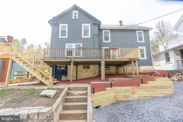 a front view of a house with a porch