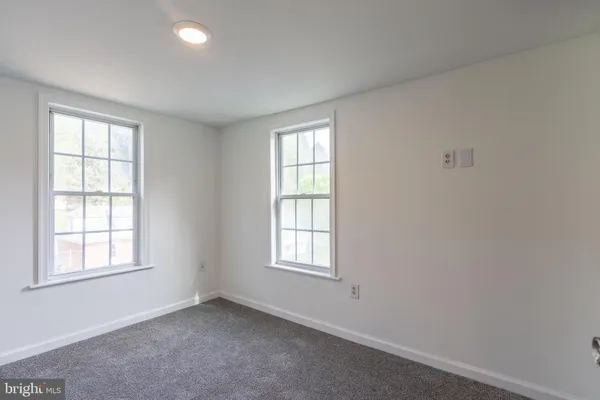 a view of a hallway with closet