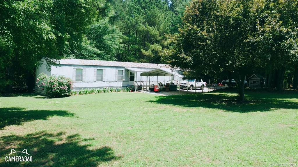 767 Holly Ridge Road Grover, NC 28073 - Photo 11 of 26 a view of house with a big yard