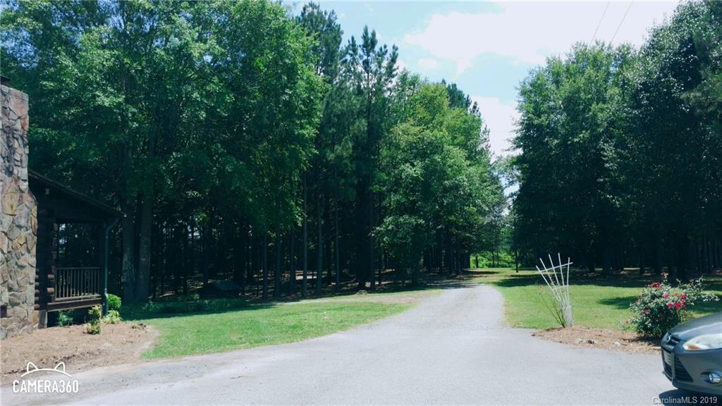 767 Holly Ridge Road Grover, NC 28073 - Photo 13 of 26 a view of garden with tall trees