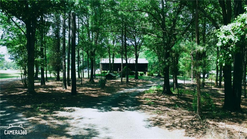 767 Holly Ridge Road Grover, NC 28073 - Photo 26 of 26 a view of a backyard with tree