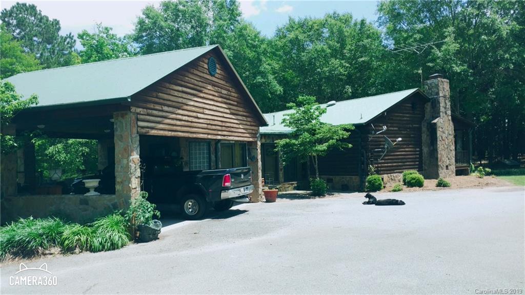 767 Holly Ridge Road Grover, NC 28073 - Photo 4 of 26 a view of backyard with a patio and garden