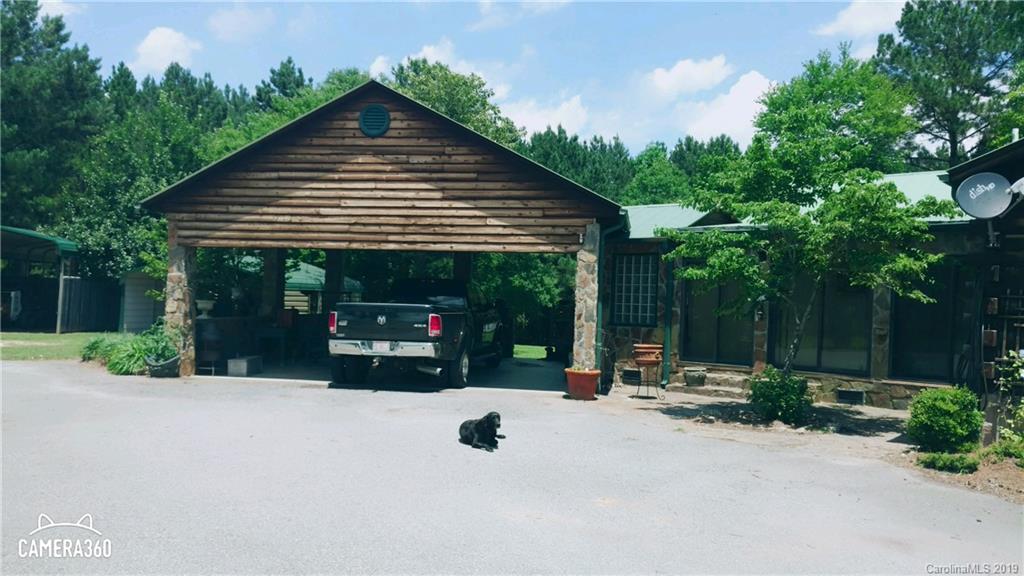 767 Holly Ridge Road Grover, NC 28073 - Photo 6 of 26 a view of a parked car in front of house