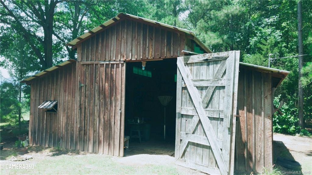 767 Holly Ridge Road Grover, NC 28073 - Photo 9 of 26 a backyard of a house with lots of green space