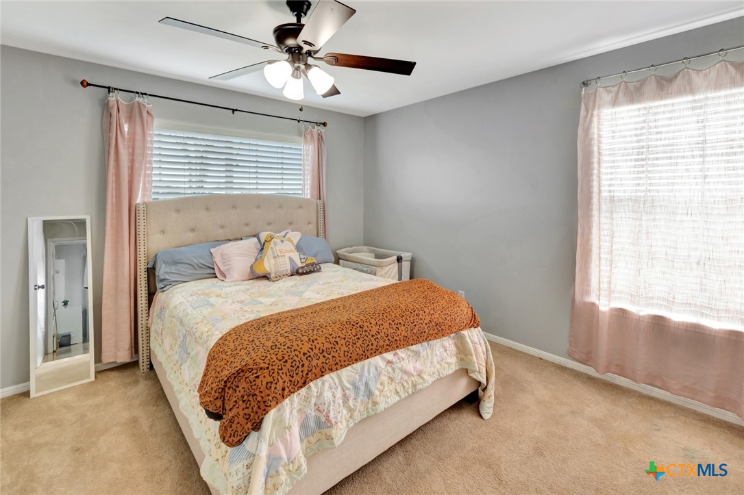 399 Keefe Road Victoria, TX 77905 - Photo 20 of 33 a bedroom with a bed and window