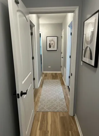 a bedroom with bed and a tv