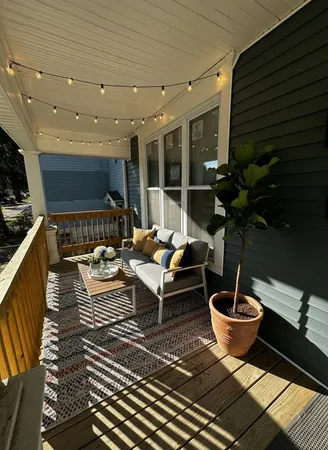 a backyard of a house with seating space