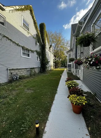 a view of a back yard of the house