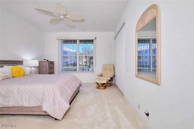 a bedroom with a bed and a closet