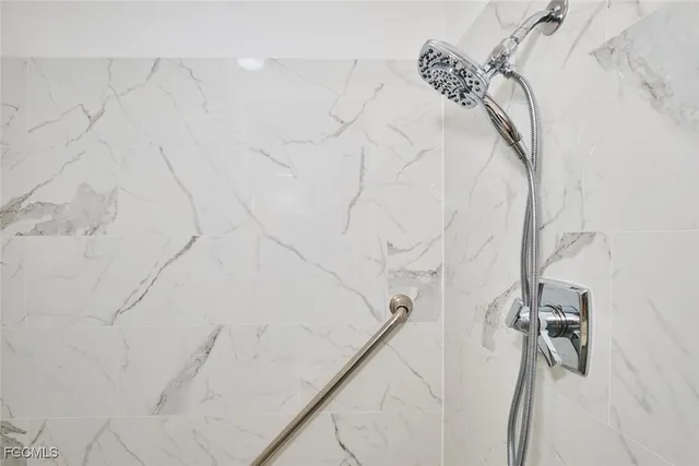 a bedroom with a workspace