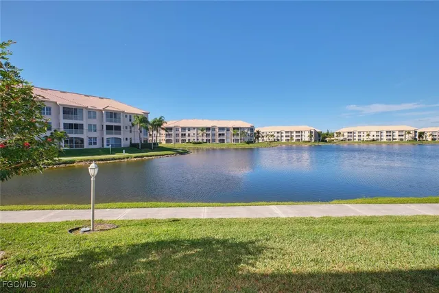 a view of a lake with a city