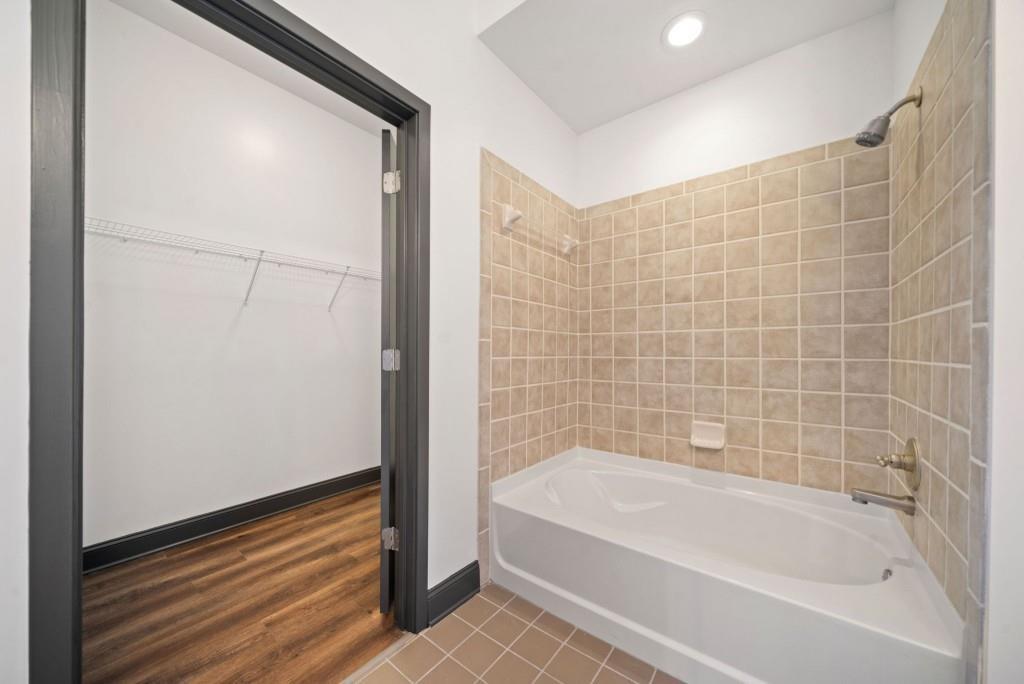 5300 Peachtree Road, Unit 3507 Atlanta, GA 30341 - Photo 26 of 32 a bathroom with a bathtub and shower