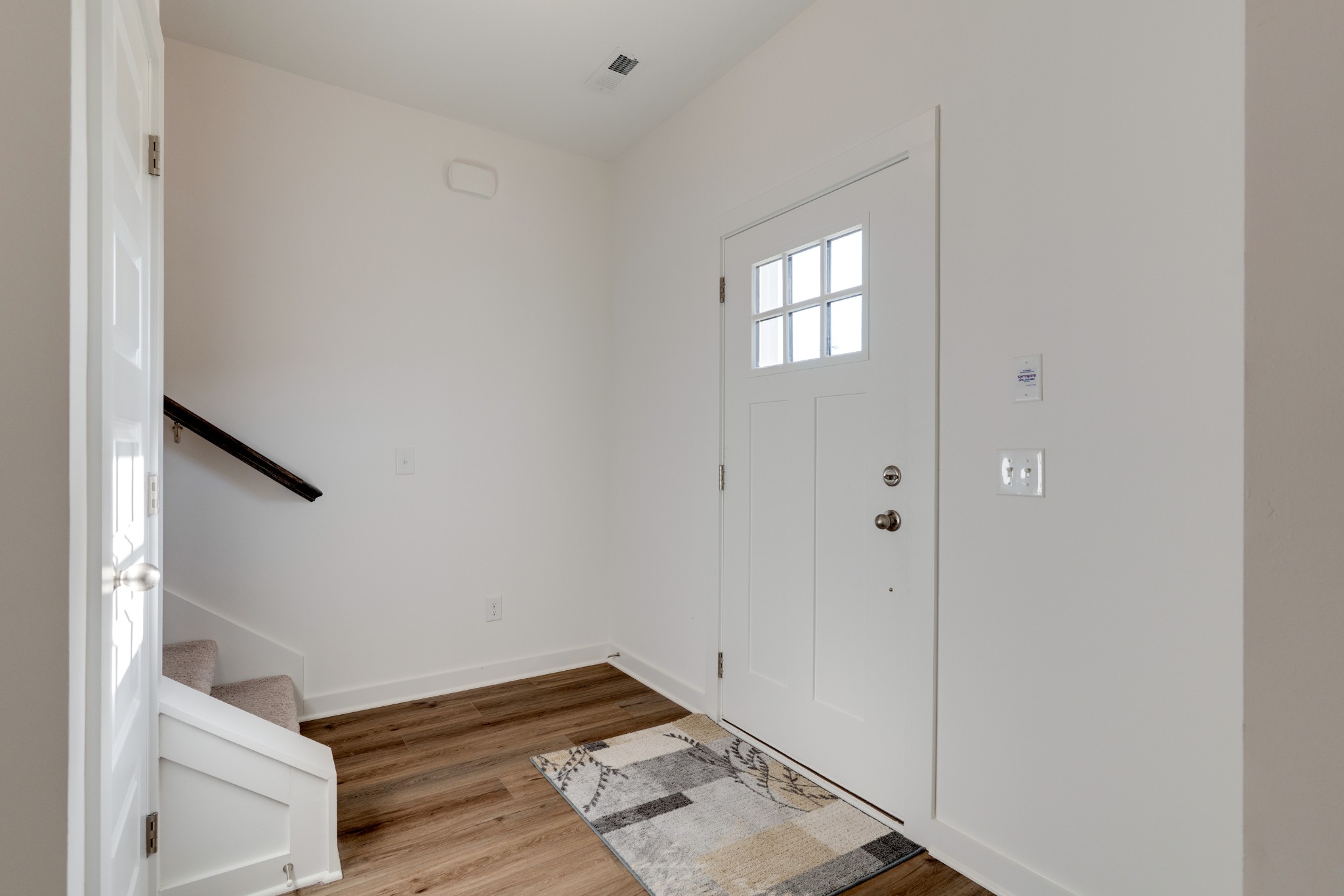 1573 Elliott Williams Way Gallatin, TN 37066 - Photo 14 of 32 a view of wooden floor and windows in a room