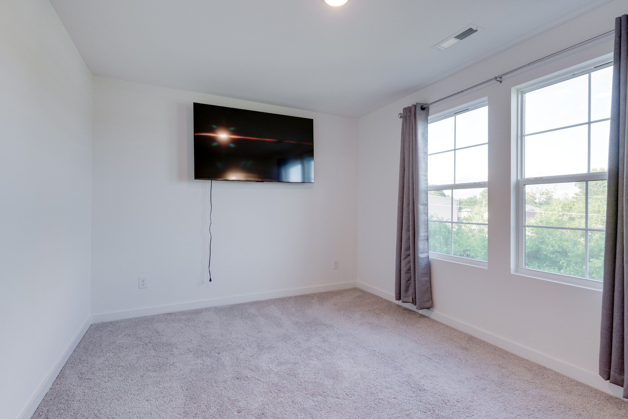 1573 Elliott Williams Way Gallatin, TN 37066 - Photo 27 of 32 a view of a livingroom with an empty space and a window
