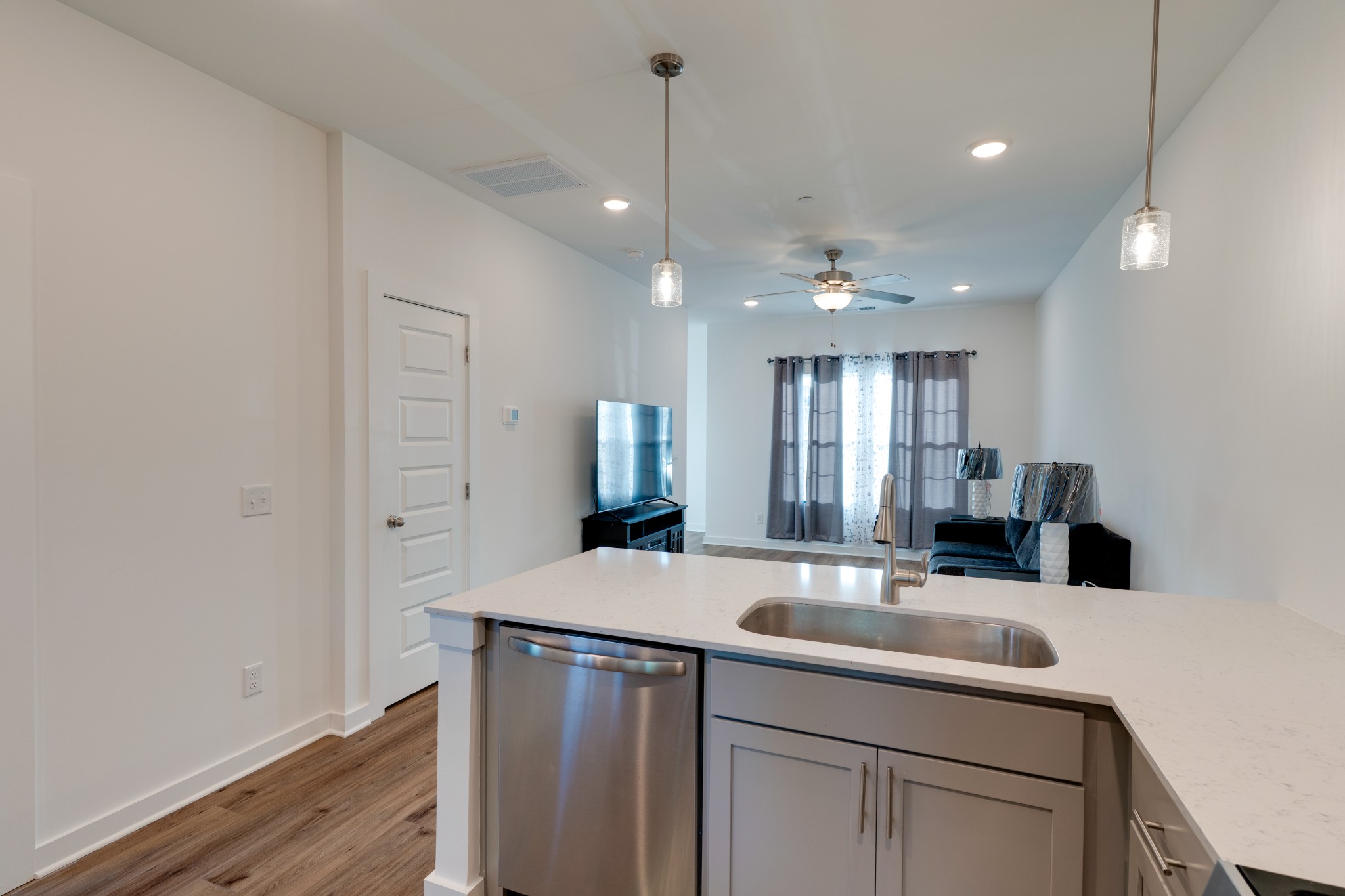 1573 Elliott Williams Way Gallatin, TN 37066 - Photo 10 of 32 a kitchen with a sink and chandelier