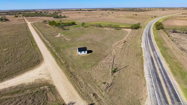 an aerial view of beach and ocean