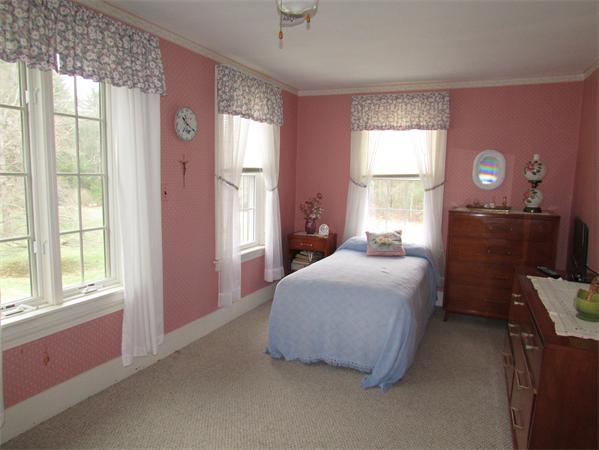 60 Farquhar Road Sturbridge, MA 01566 - Photo 17 of 30 a bedroom with a bed and a window