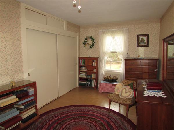 60 Farquhar Road Sturbridge, MA 01566 - Photo 23 of 30 a bedroom with a bed and furniture