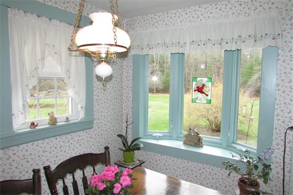 60 Farquhar Road Sturbridge, MA 01566 - Photo 6 of 30 a bath room with a chandelier and a bath tub