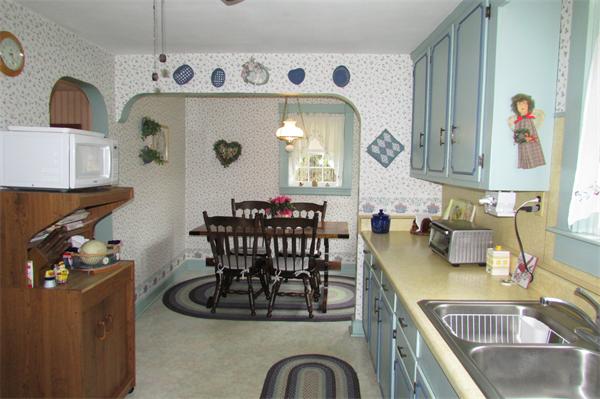 60 Farquhar Road Sturbridge, MA 01566 - Photo 7 of 30 a kitchen with a table and chairs in it