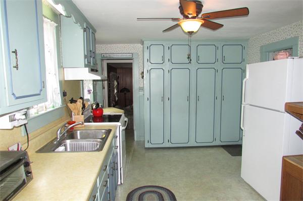 60 Farquhar Road Sturbridge, MA 01566 - Photo 9 of 30 a view of kitchen sink washer and dryer