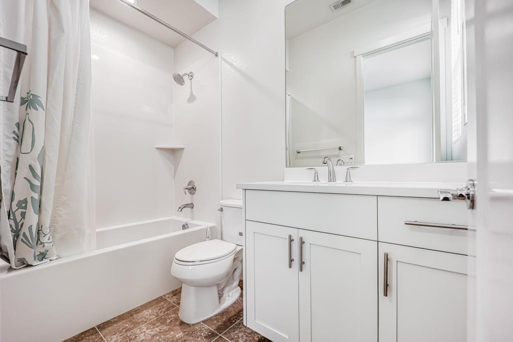 183 Nexus Loop San Jose, CA 95110 - Photo 29 of 33 a bathroom with a sink toilet and shower