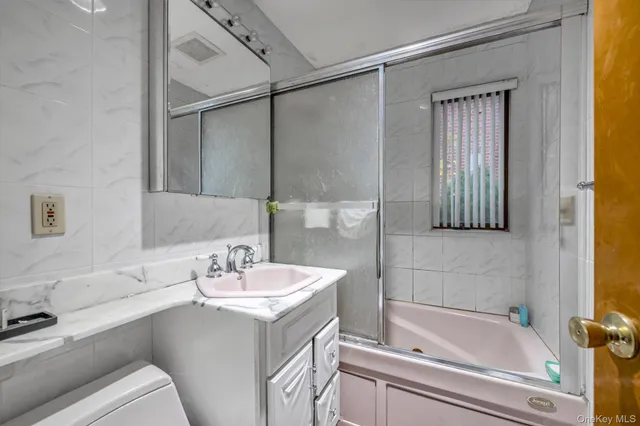 a bathroom with a sink and a bathtub
