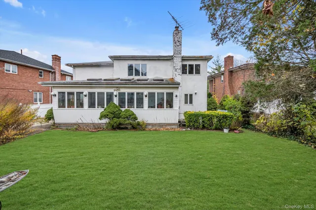 a view of a house with a big yard