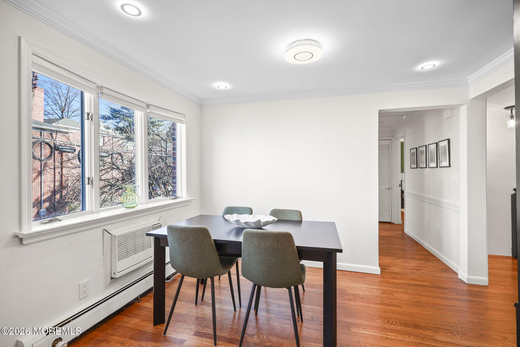 39 Manor Drive Red Bank, NJ 07701 - Photo 11 of 19 a view of a dining room with furniture window and wooden floor