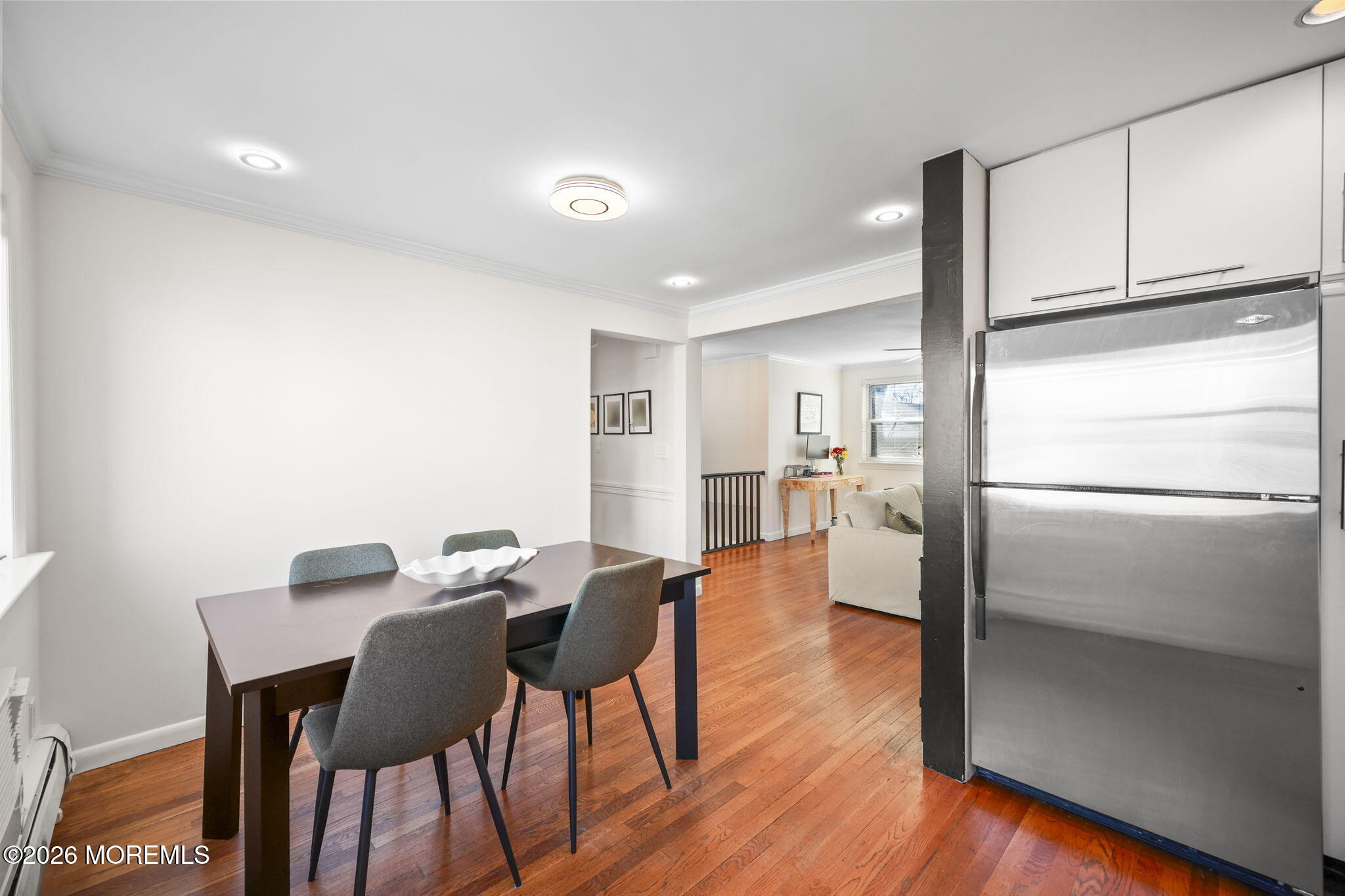 39 Manor Drive Red Bank, NJ 07701 - Photo 12 of 19 a view of a dining room with furniture and wooden floor